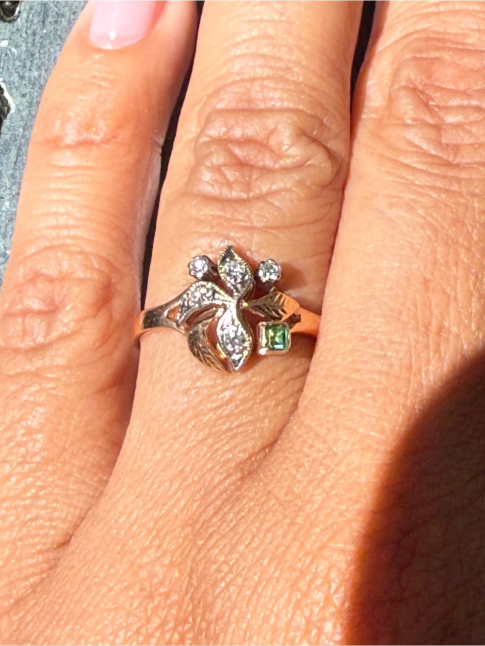 Elegant Floral Gold Ring with Green Accent and Clear Stones